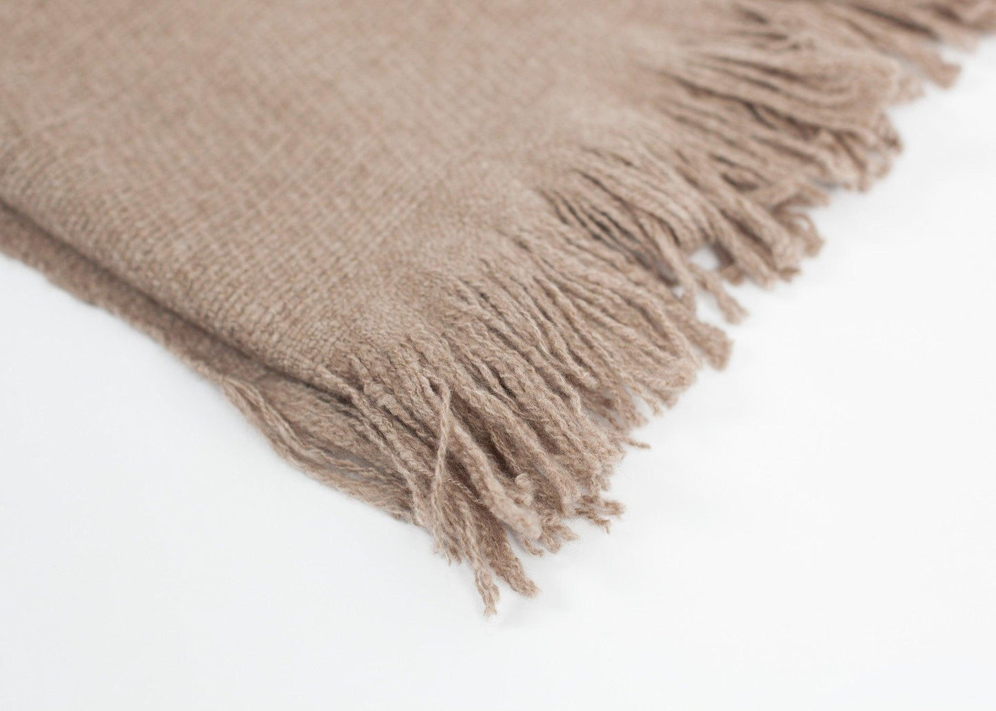 Cashmere Tassel Blanket in Brown.