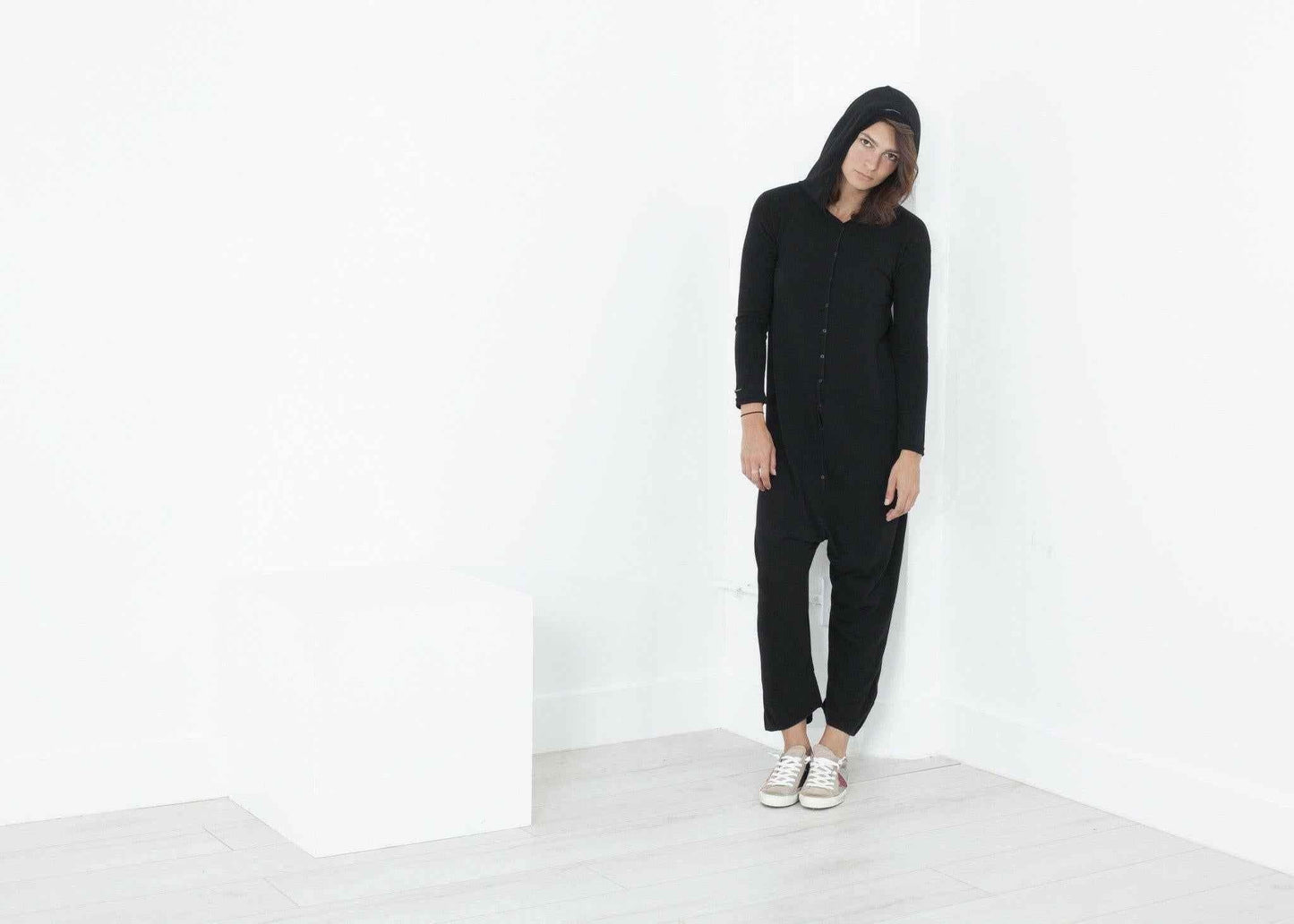 Knit Hooded Jumpsuit in Black.