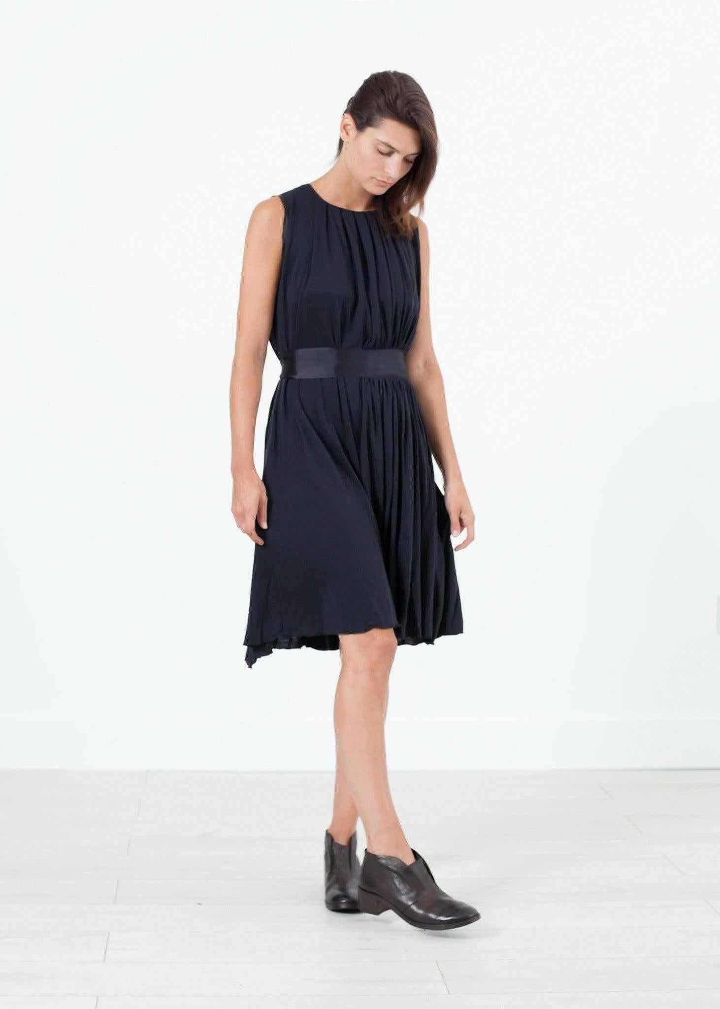 Sleeveless Pleated Dress in Navy.