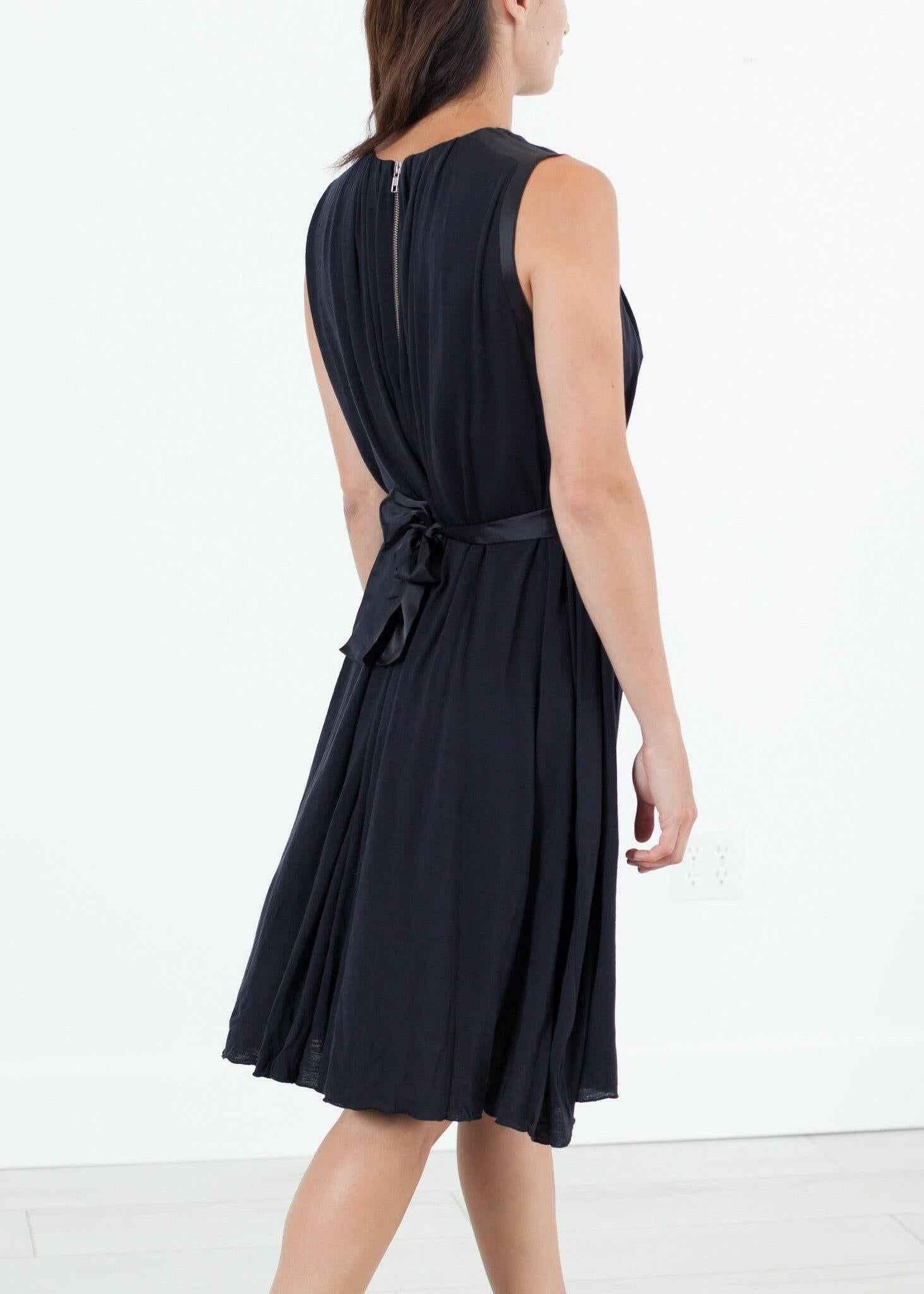 Sleeveless Pleated Dress in Navy.