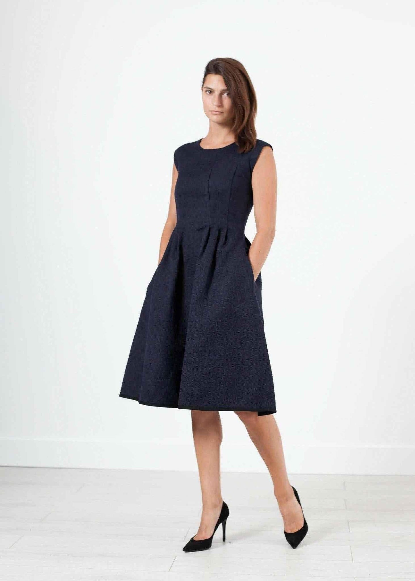 Pleated Rita Dress in Dark Navy.