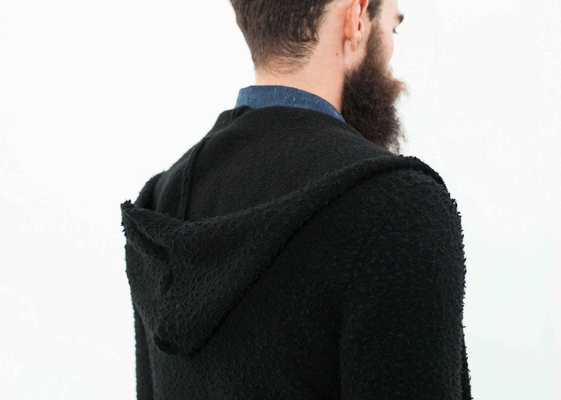 Pill Zip Sweater in Black.