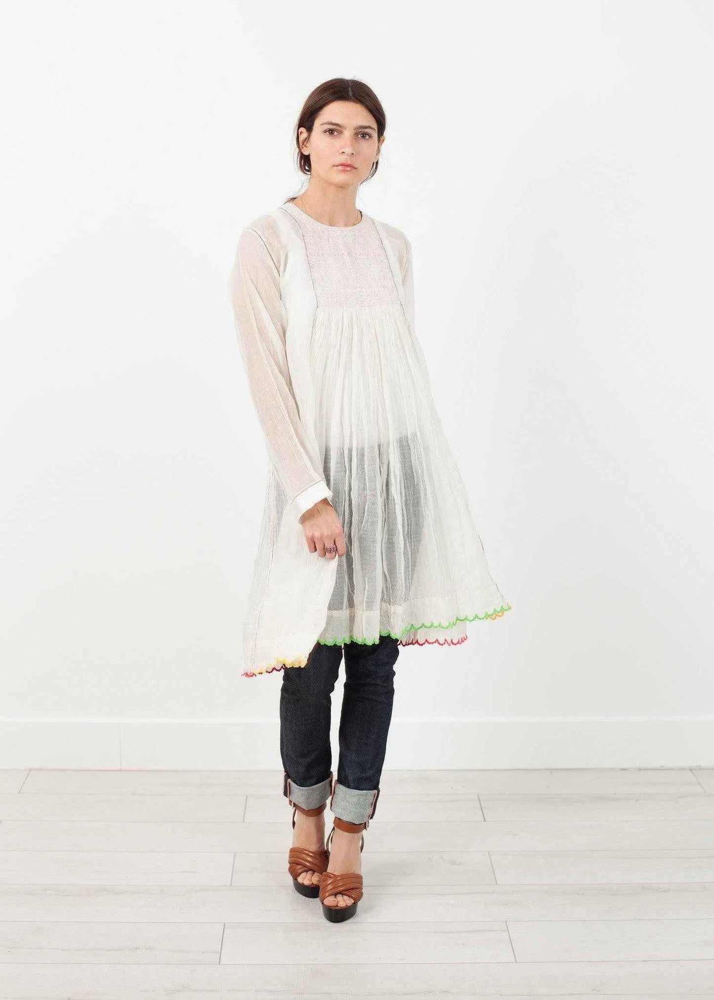 Pink Bib Dress in White.