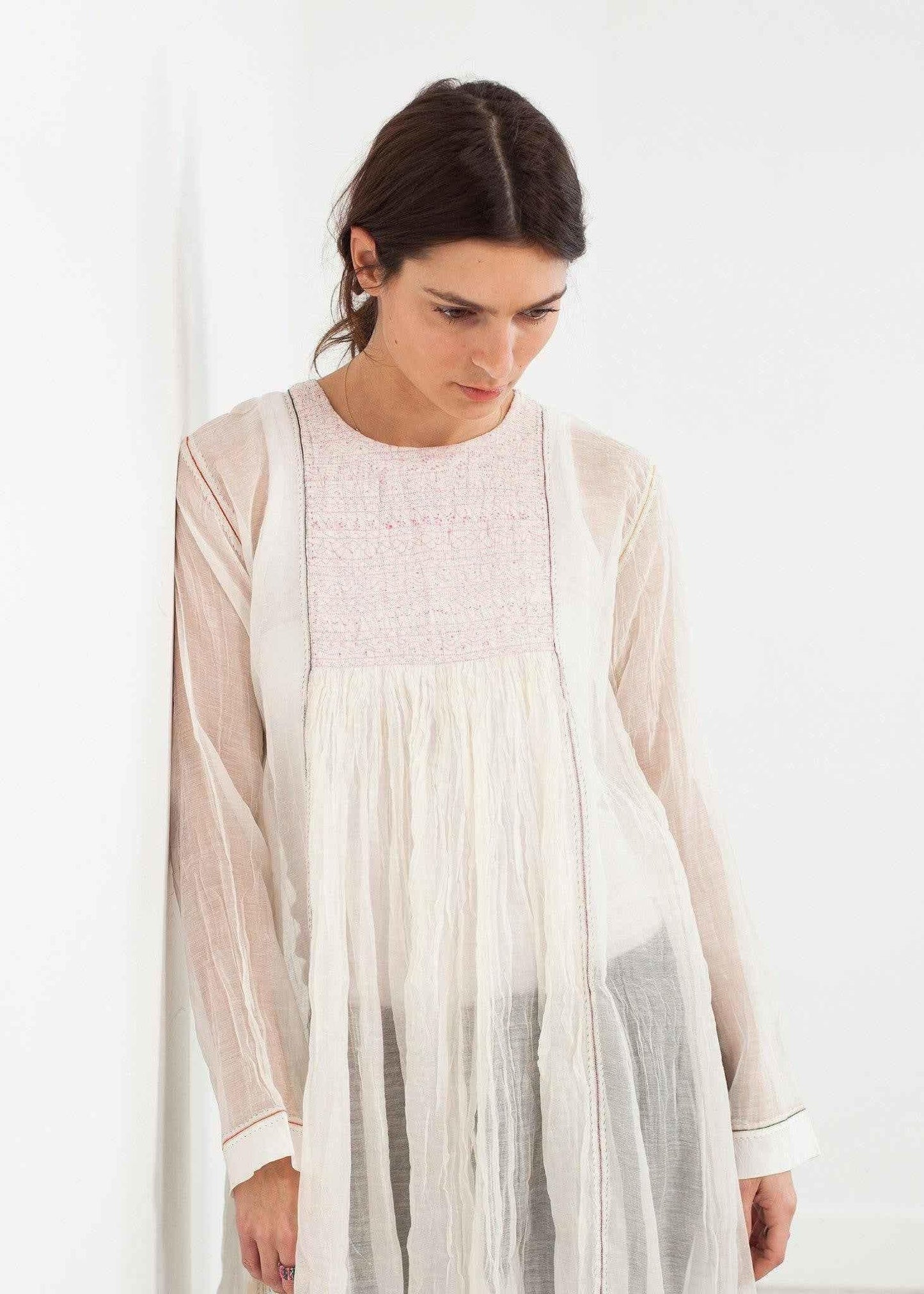 Pink Bib Dress in White.