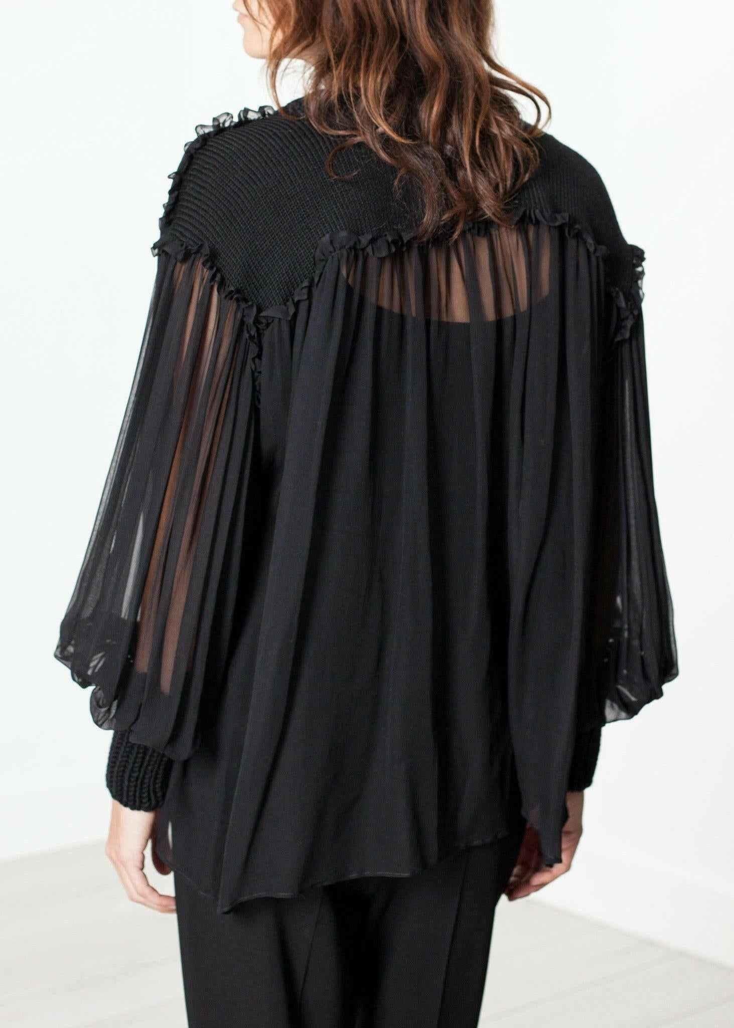 Poet Silk Sweater in Black.