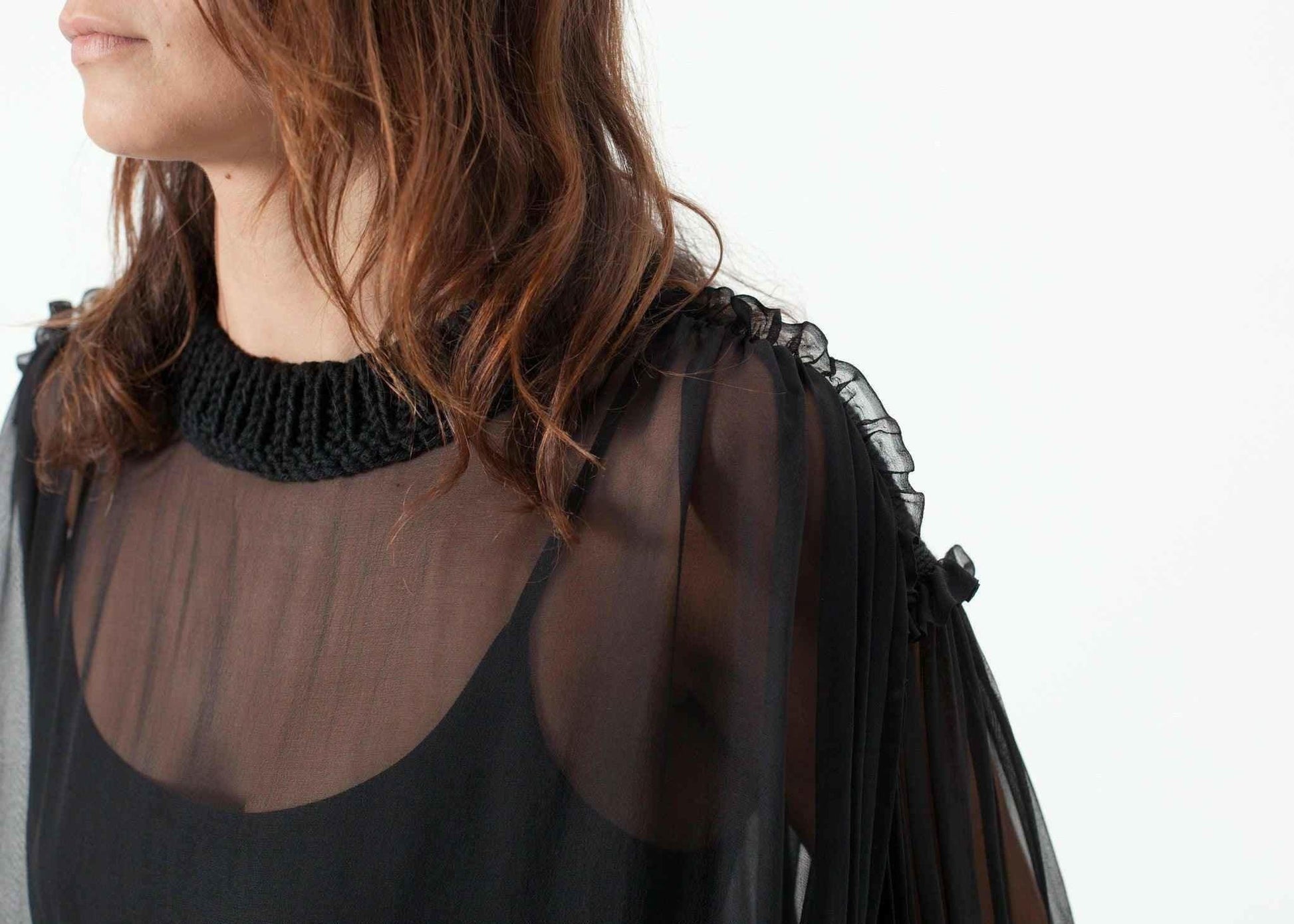 Poet Silk Sweater in Black.
