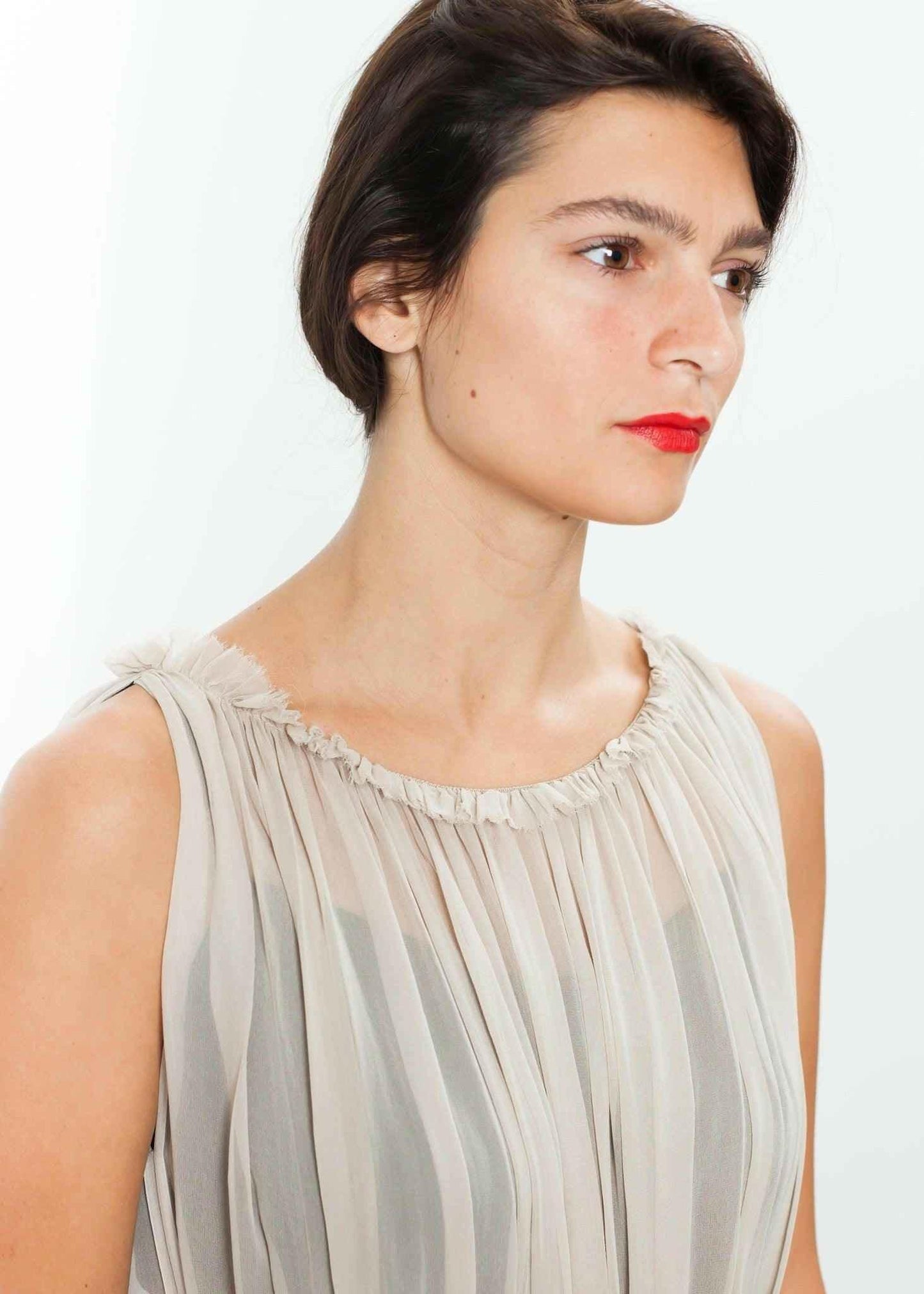 Chiffon Cape Back Dress in Sand.
