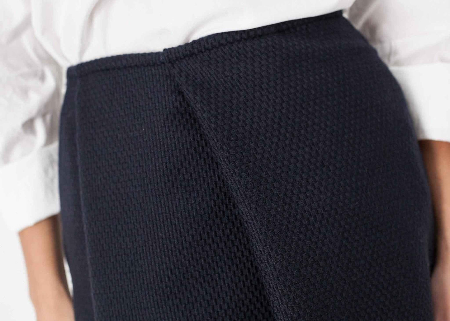 Pleated Wool Skirt in Navy.