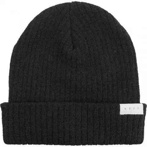 Black ribbed knit beanie with folded cuff and small white tag, winter hat.