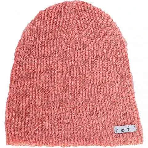 Pink knit beanie hat with visible label, winter headwear accessory