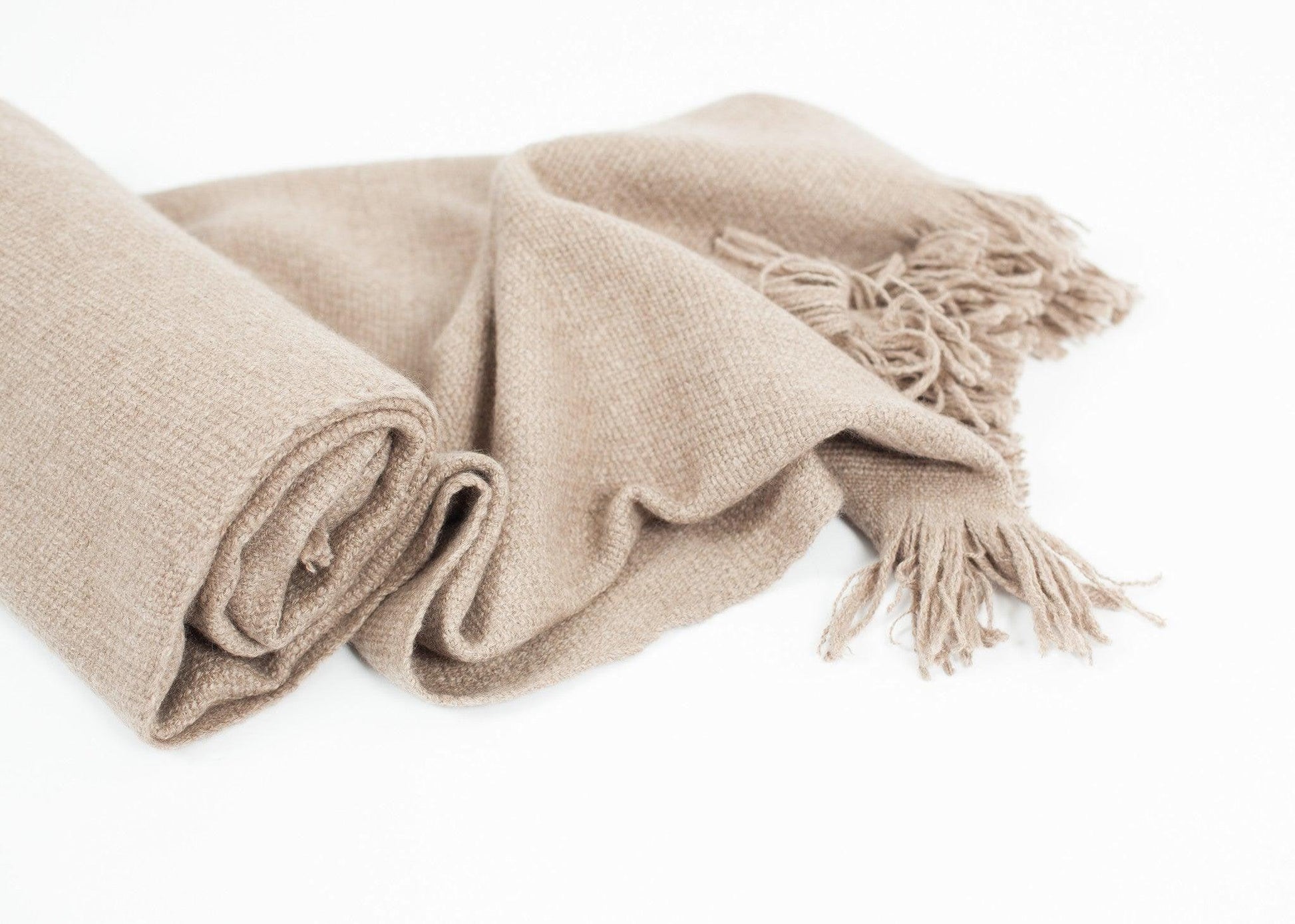 Cashmere Tassel Blanket in Brown.