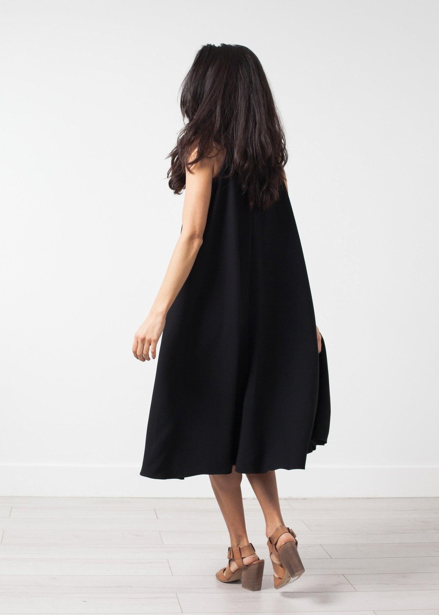 Sleeveless Flow Dress.