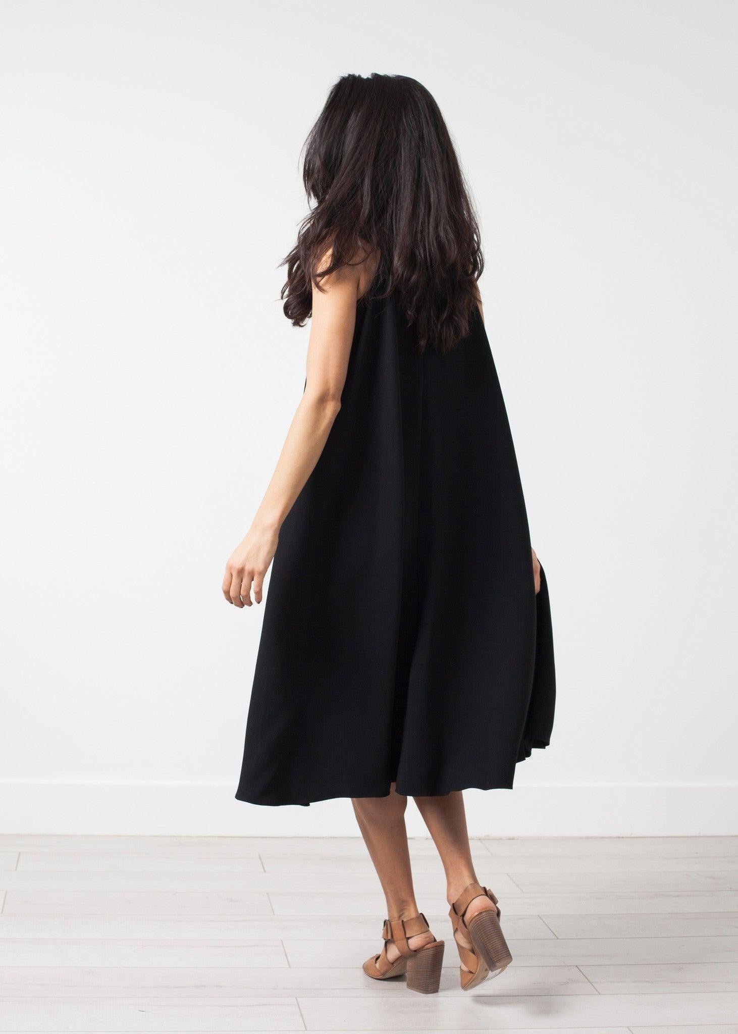 Sleeveless Flow Dress.