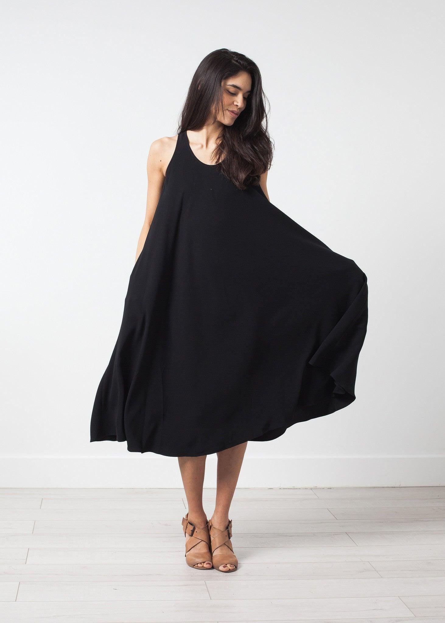 Sleeveless Flow Dress.