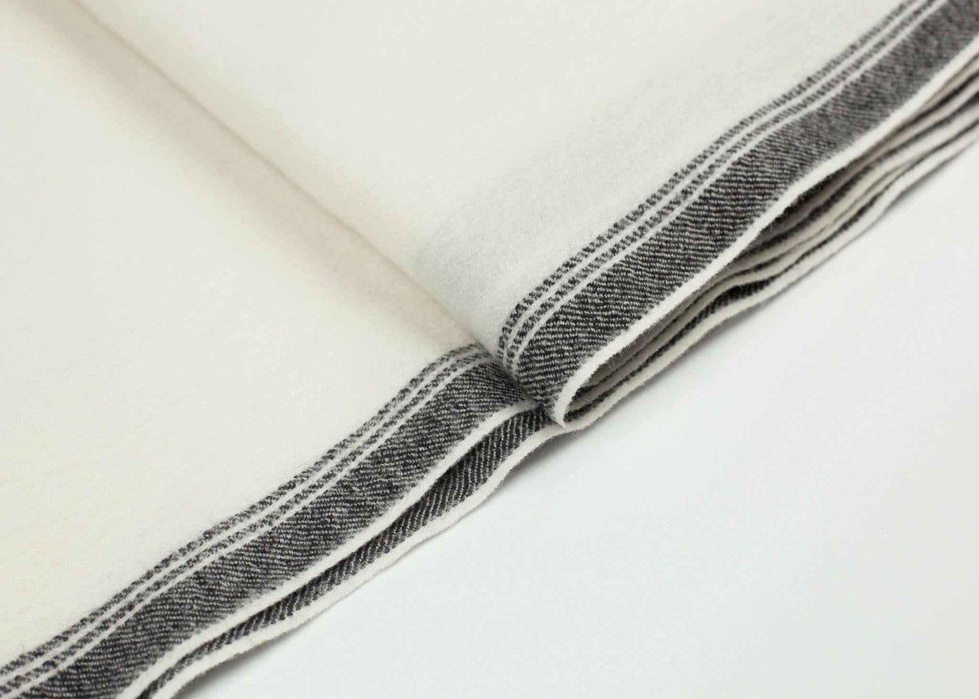 Edged Wool Scarf in Off White.