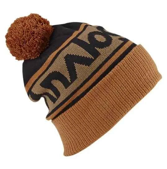 Brown and black knit beanie with pom pom and patterned design