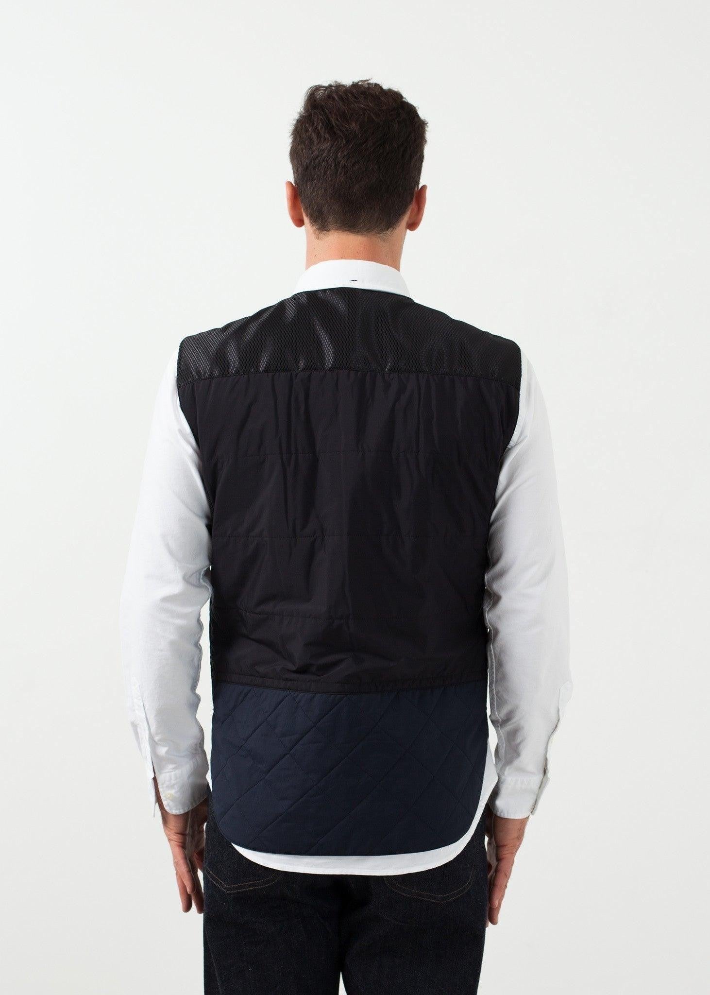 Reversible Quilted Vest.