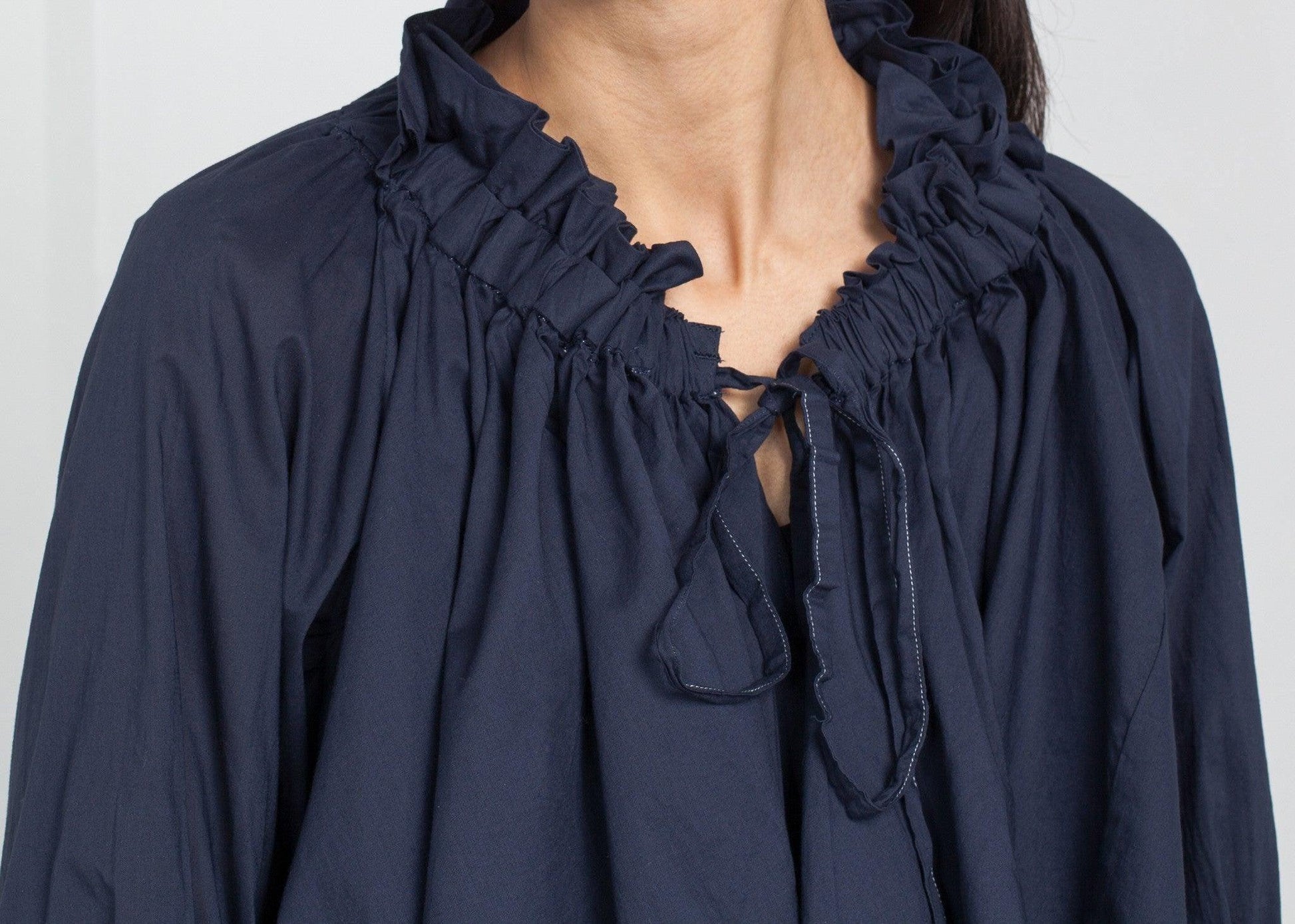 Ruffled Cabin Top.