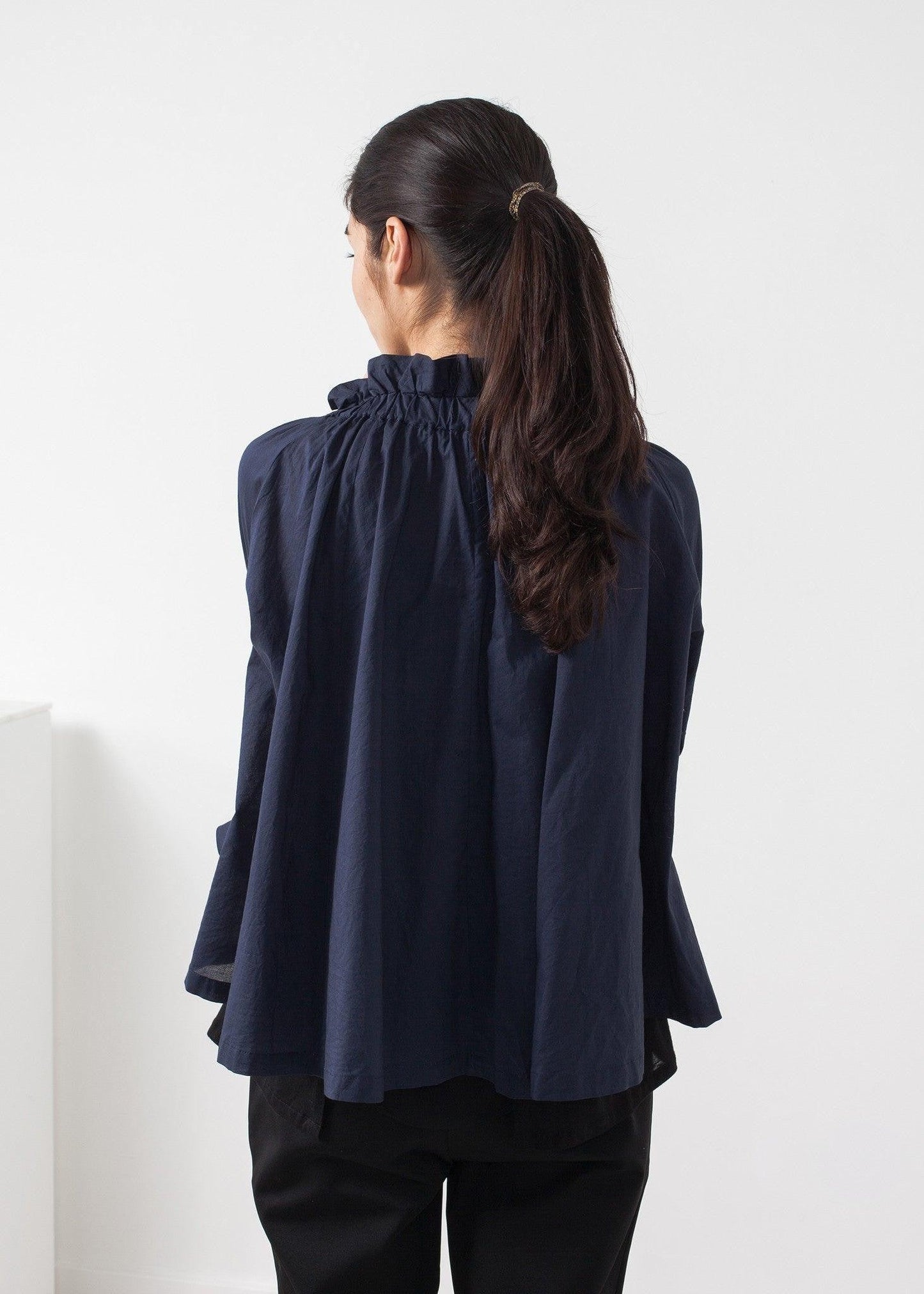 Ruffled Cabin Top.