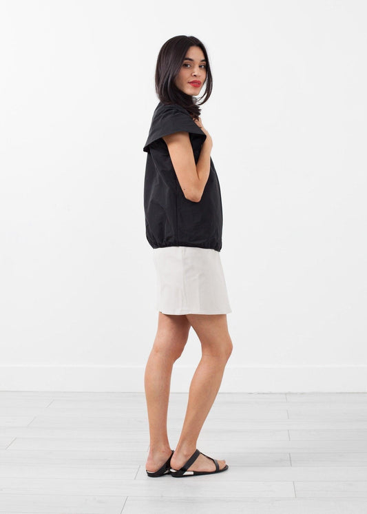Sleeveless Cape Jacket.